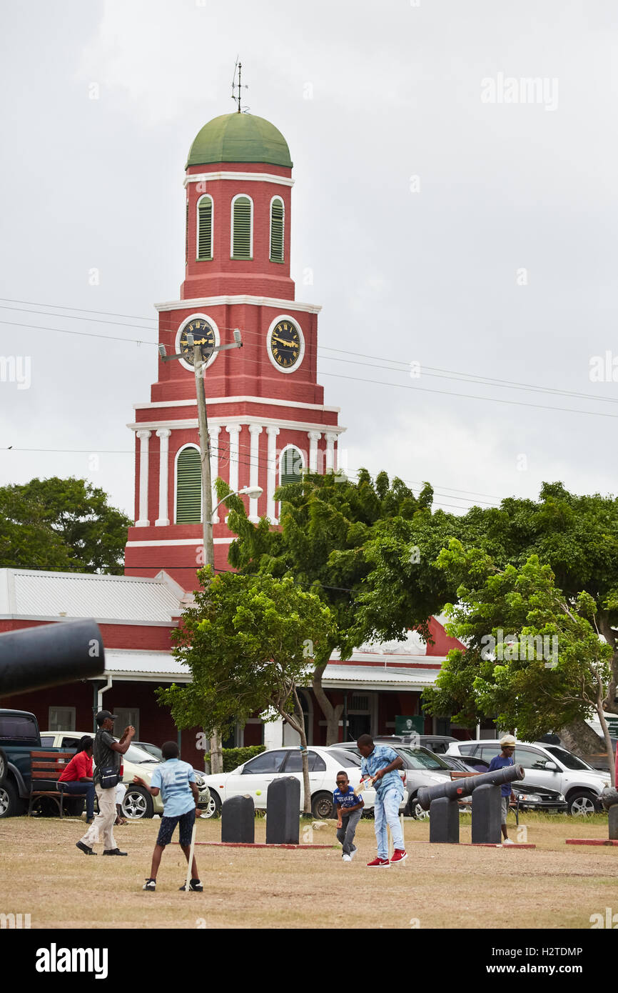 Barbados Bridgetown Garrison clock tower  guardhouse Garrison Savannah built 1803 Savannah Racetrack local youths children nativ Stock Photo