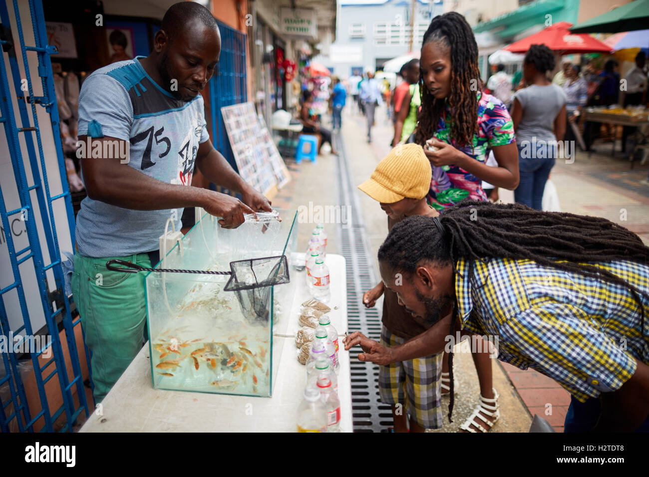 Barbados market place traders   Bridgetown Poor rundown rubbish scruffy deprived common poverty ghetto  un-kept  Shabby waiting Stock Photo