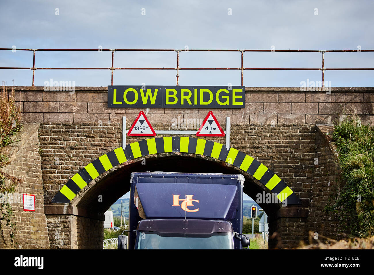 Low Bridge warning sign strike hgv lorry stuck Adlington Manchester to