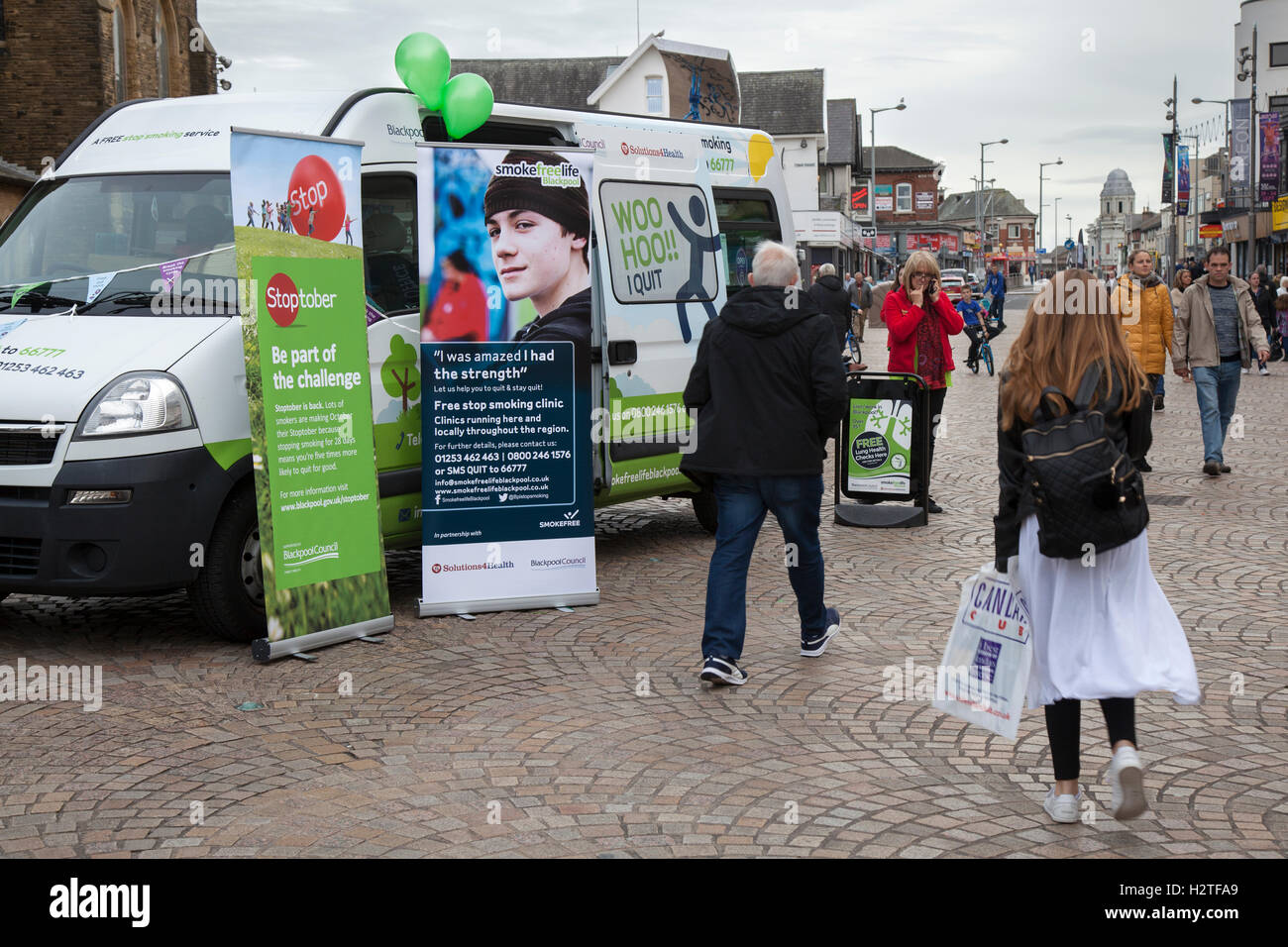 Stop Smoking campaign. A private company, Solutions4Health, contracted by Blackpool Council to try and reduce the number of smokers in the resort which is about 30% much higher than the Uk national average. Stoptober, a campaign challenge vehicle in St John's Square, Blackpool, UK Stock Photo