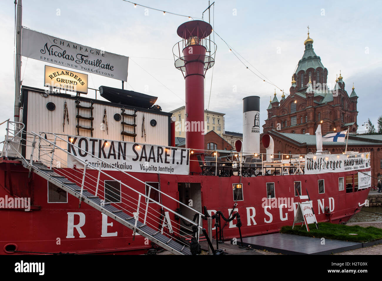 Restaurant in lightship in North-Port and orthodox Uspenski-cathedral, Helsinki, Finland Stock Photo