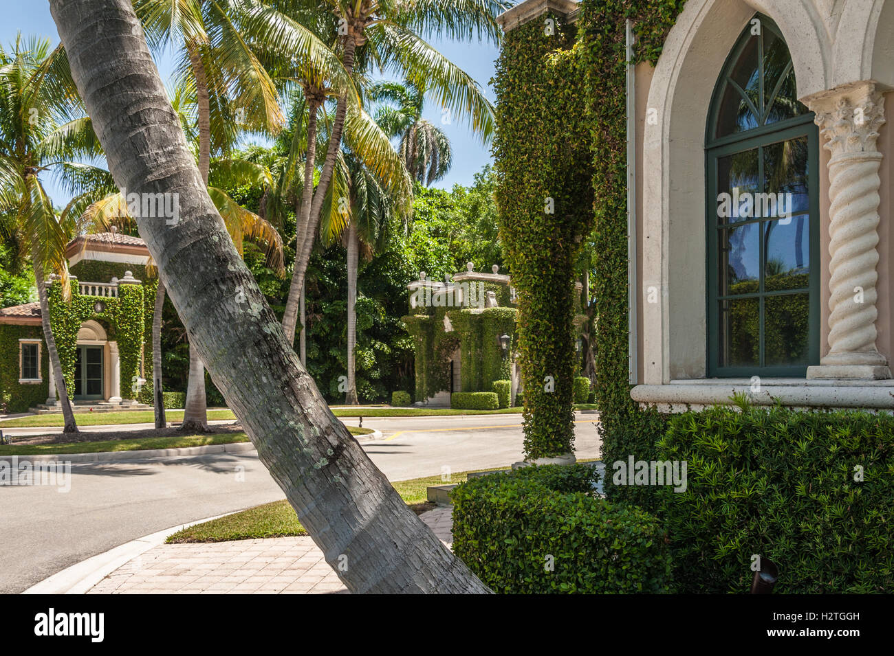 Foliage covered architecture at the lush and beautiful entrance to Phipps Estates on the island of Palm Beach, Florida. (USA) Stock Photo