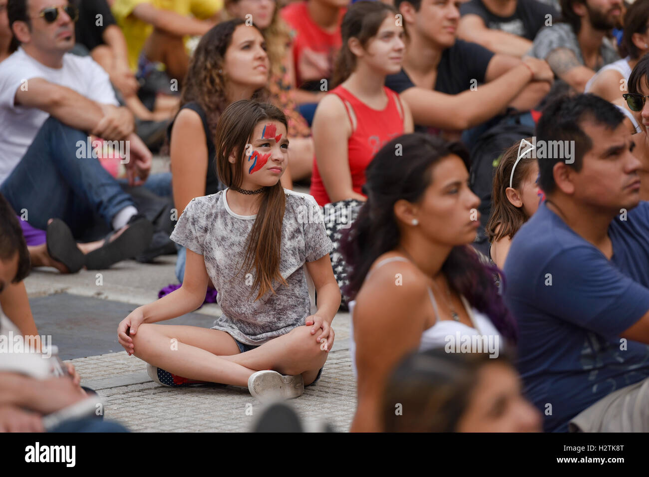 Buenos Aires, Argentina. 13 Jan, 2016. Bowie's fans wears tribute make-up during a projection of David Bowie's videos. Stock Photo