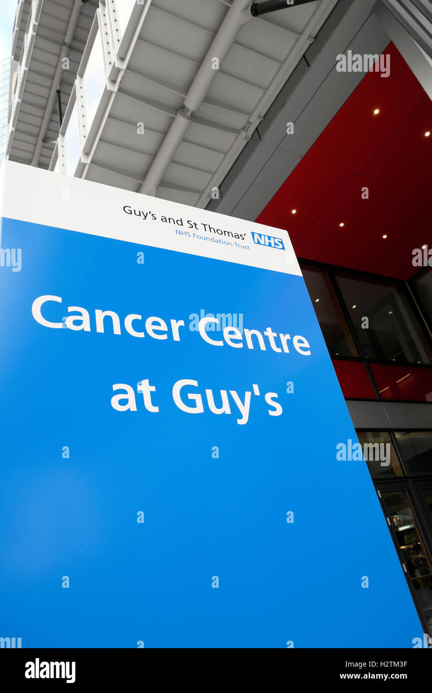 Cancer Centre at Guys Hospital sign at the entrance of the new hospital in Southwark, South London, England, UK  KATHY DEWITT Stock Photo