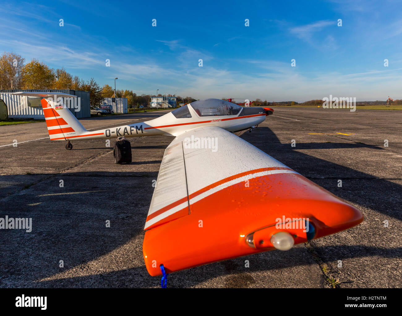 Motor sailer Dimona H36 in the morning foe on the apron of the airfield Rechlin Airpark, Lärz, Mecklenburger Seenplatte,, Stock Photo