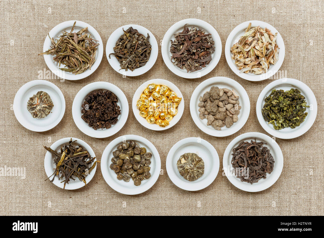 Composition of different natural dry tea leaves Stock Photo