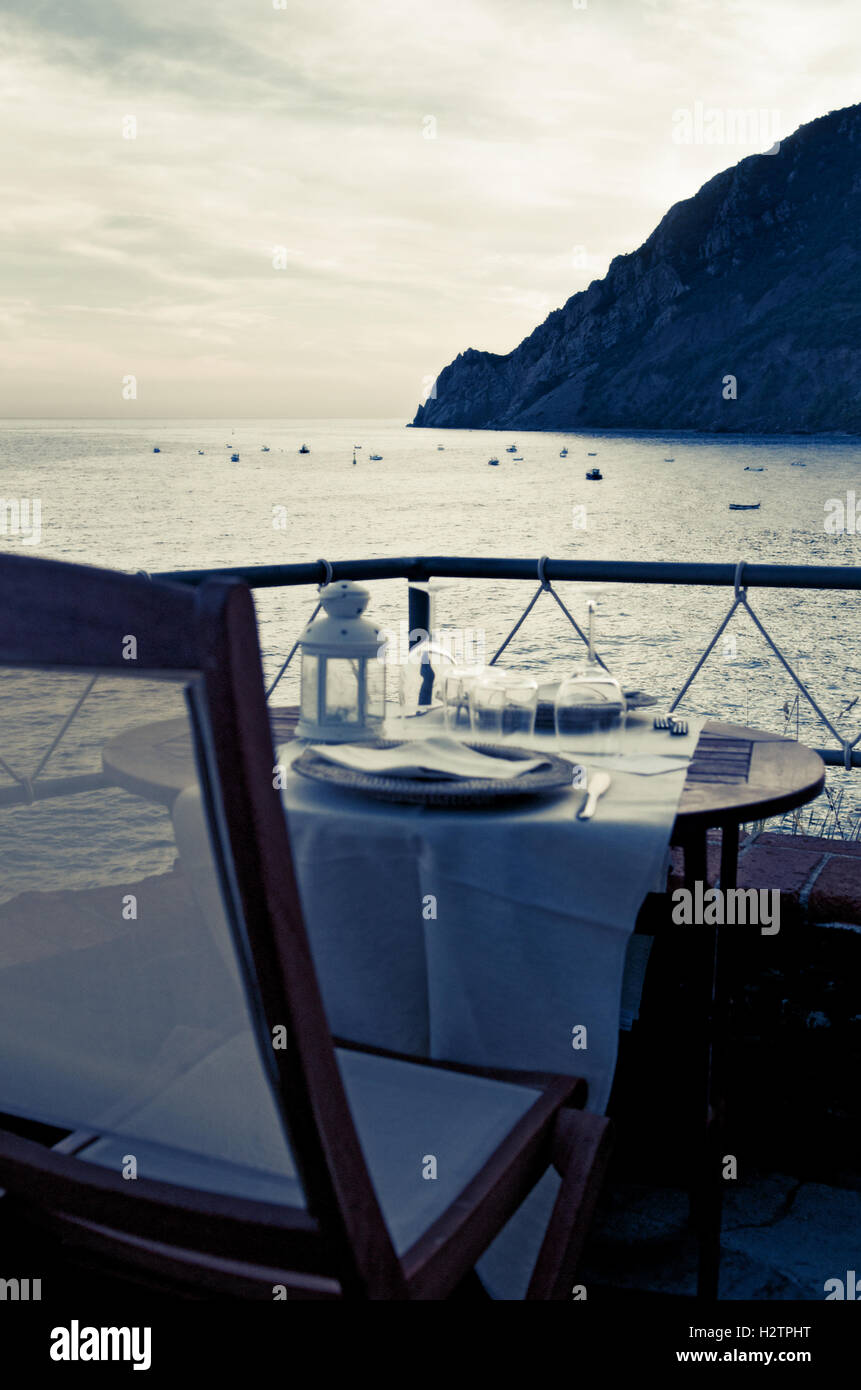 Dining table, seaside restaurant, Monterosso al Mare, Cinque Terre, La Spezia, Italy Stock Photo