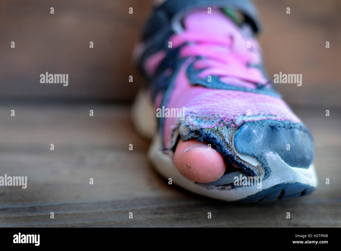 Old shoes with holes worn down shabby for homeless clothing toes ...