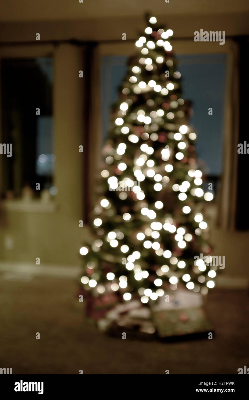 Detail of Christmas tree lights defocused focus blurry Stock Photo