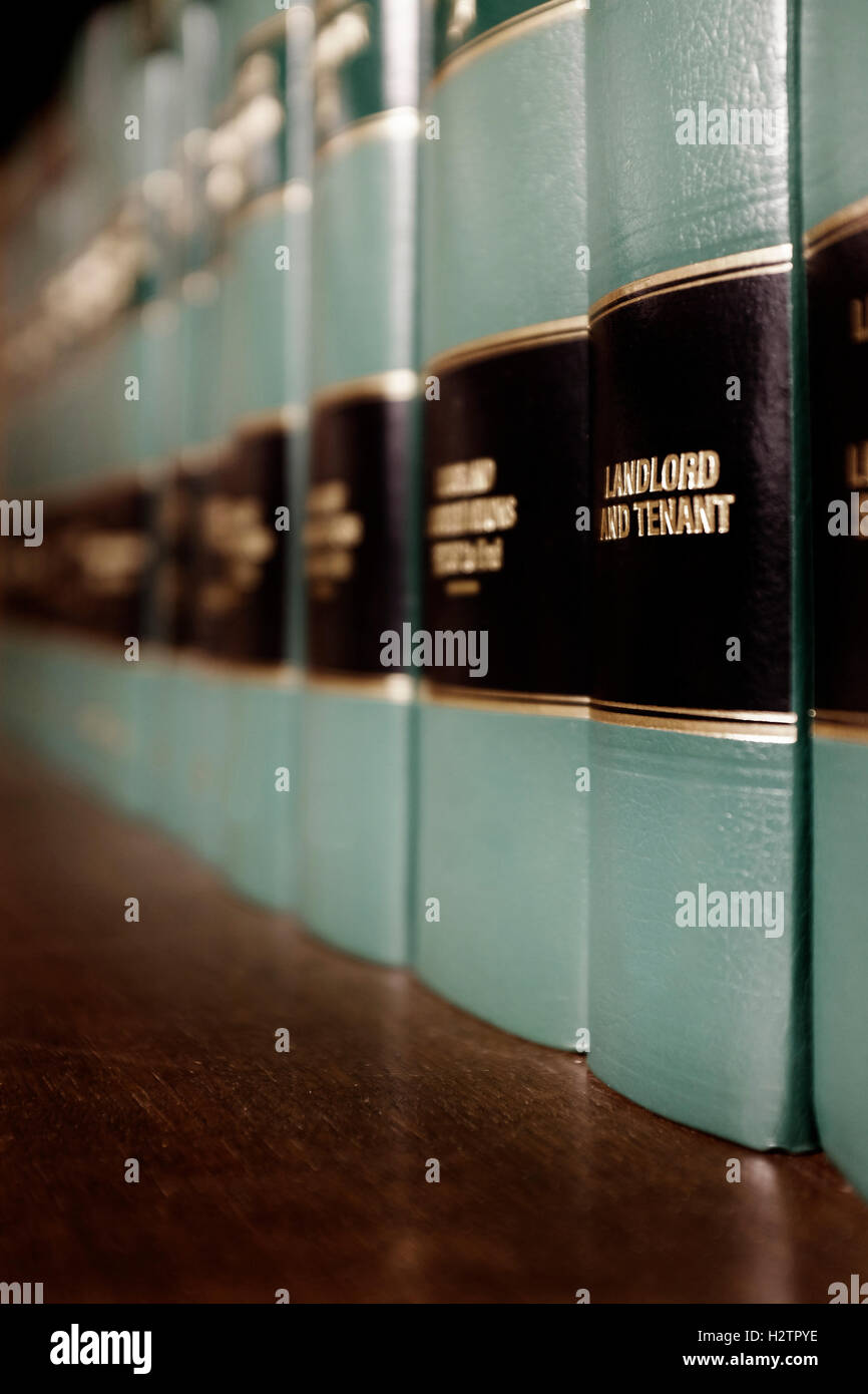Close up of several volumes of law books of codes and statutes for Sales Stock Photo