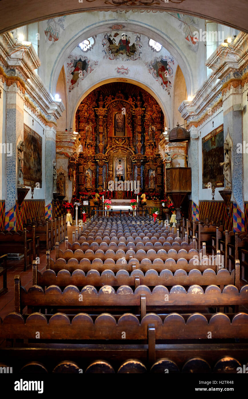 Interior of church chapel with religious symbols Stock Photo