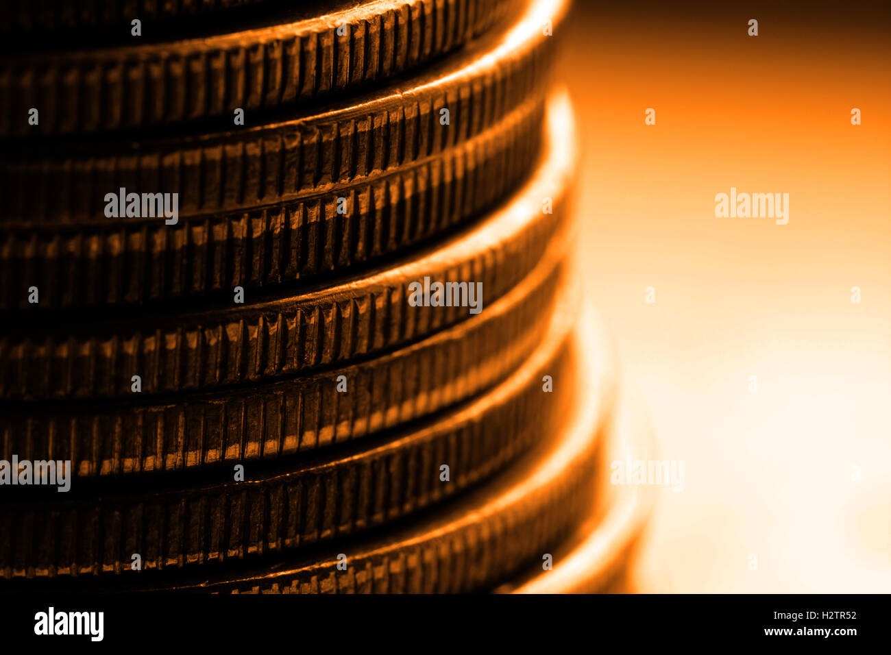 Pile of old coins and bullion with dark background Stock Photo