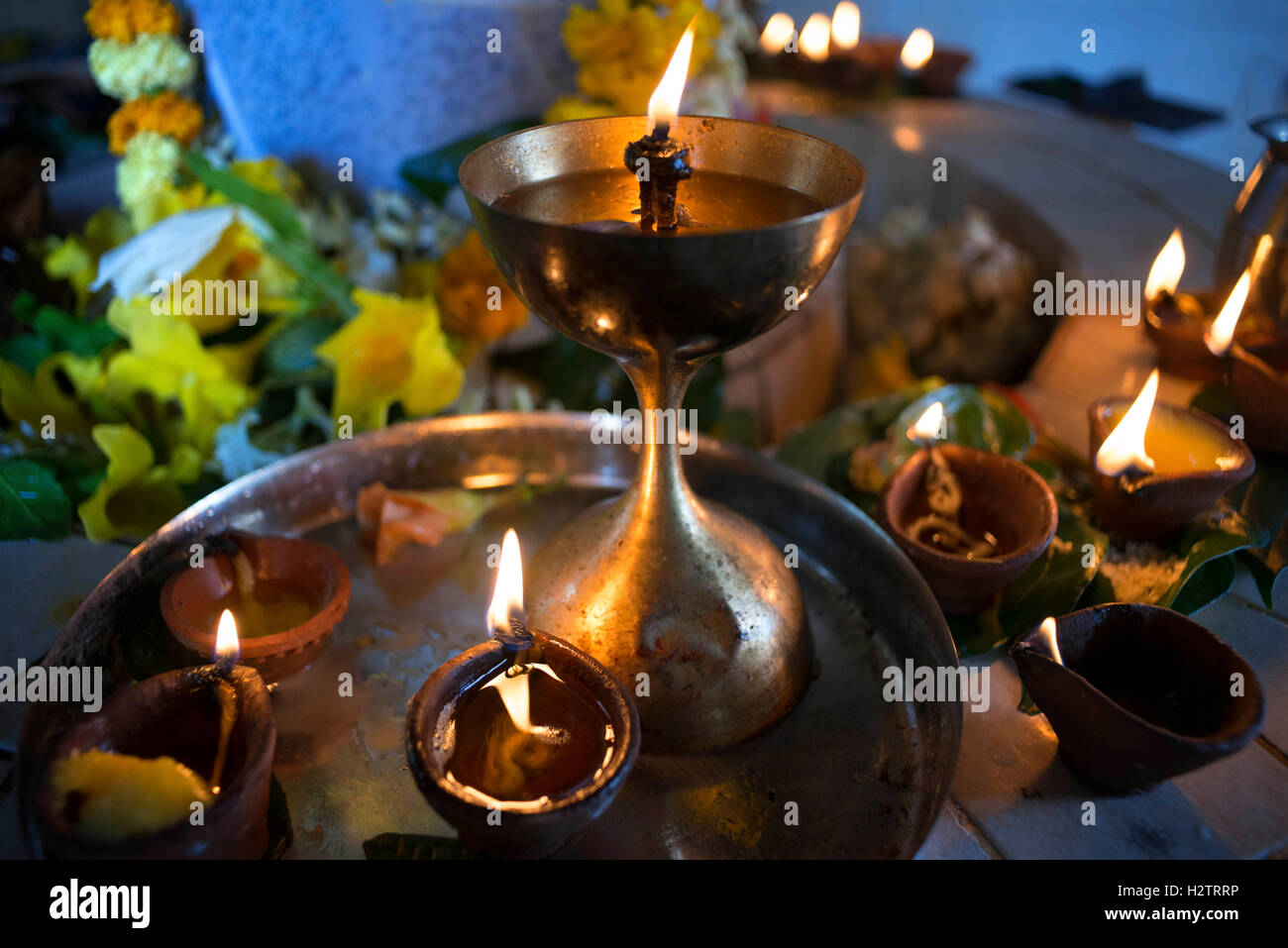 Maheswarnath temple in Triolet, the largest Hindu temple on Mauritius. Candles for prayer. Stock Photo