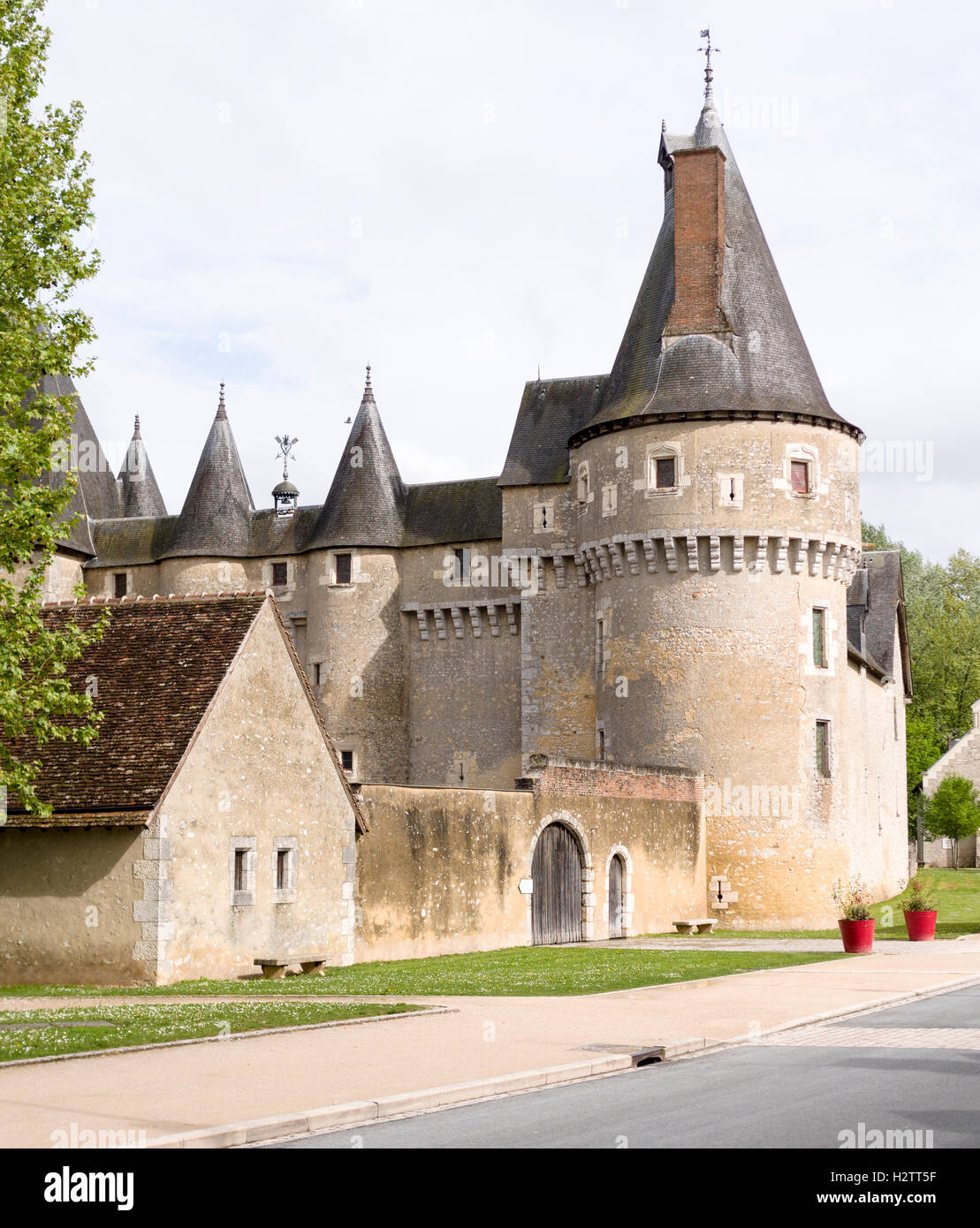 Entrance to the Chateau de Fougeres-sur-Bievre. A fortified tower flanks the walled entrance to this fortified house Stock Photo