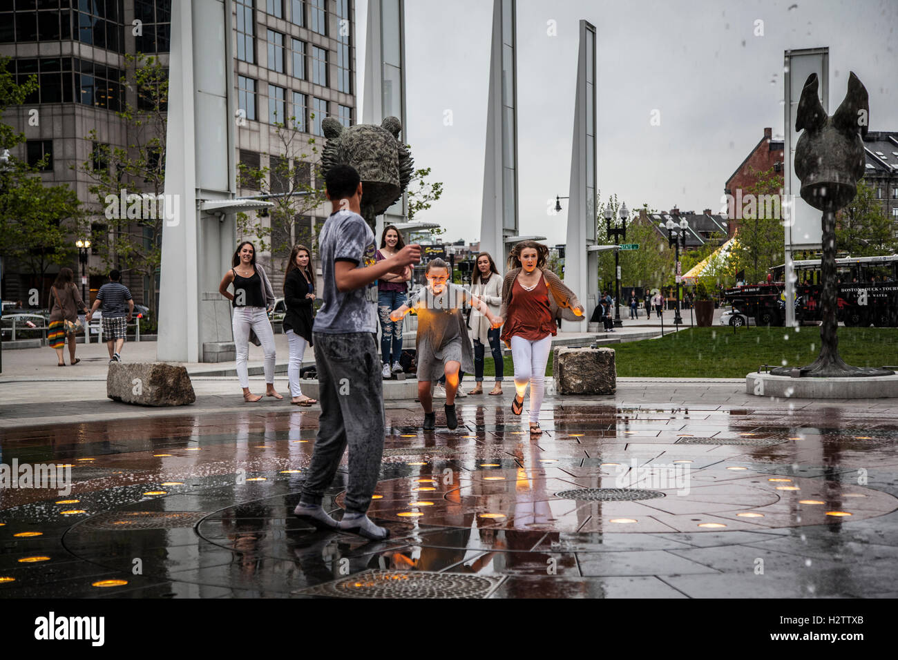 Young people having fun in the Rings Fountain, Boston Stock Photo Alamy