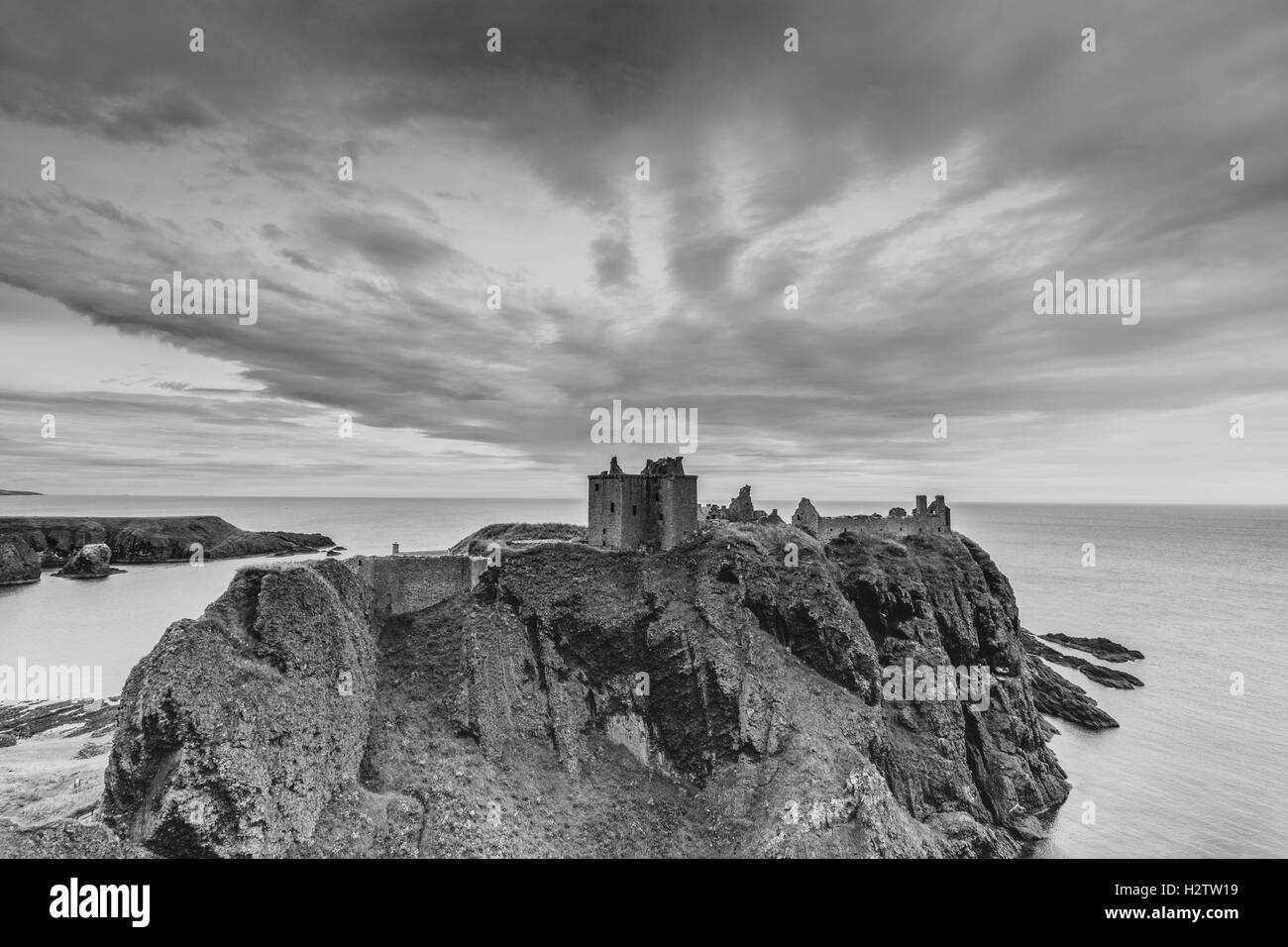 A black and white view of the famous Dunnottar Castle in Scotland Stock Photo