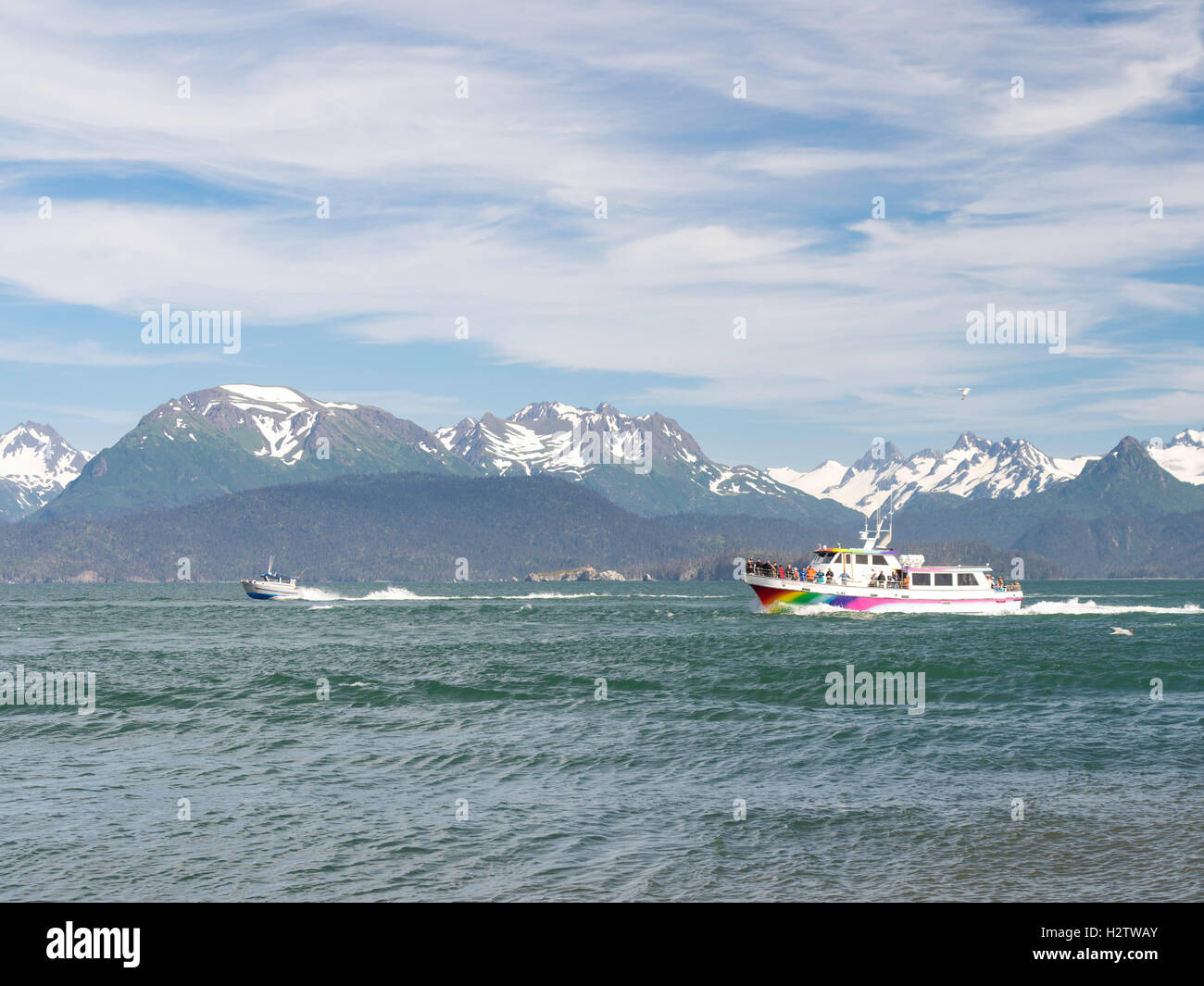 A tour boat returns to harbor; Homer Spit, overlooking Kachemak Bay