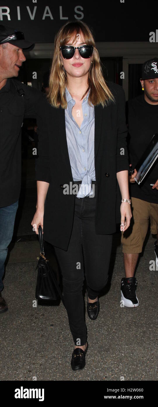 Dakota Johnson arrives at the airport  Featuring: Dakota Johnson Where: Los Angeles, California, United States When: 22 Jul 2016 Stock Photo