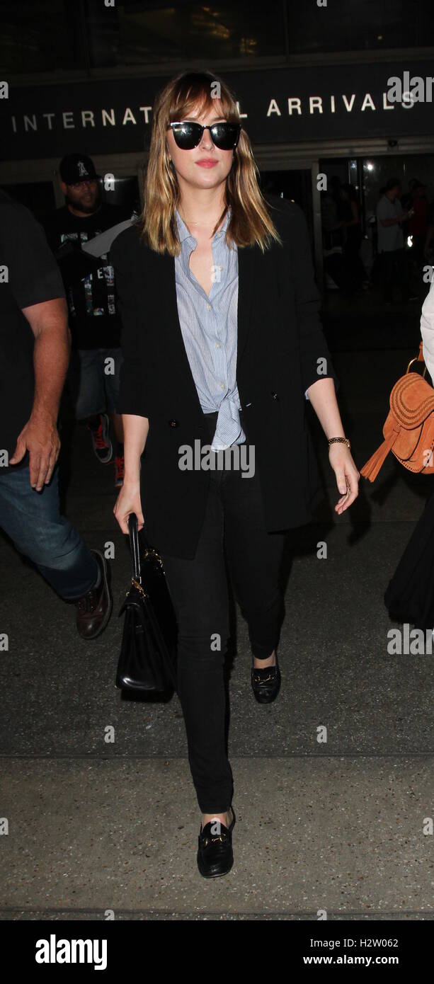 Dakota Johnson arrives at the airport  Featuring: Dakota Johnson Where: Los Angeles, California, United States When: 22 Jul 2016 Stock Photo