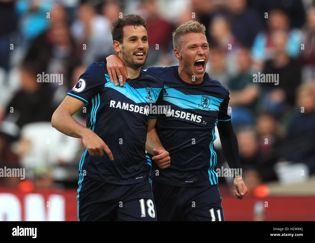 Middlesbrough's Cristhian Stuani (left) celebrates scoring his side's first goal with team-mate Viktor Fischer during the Premier League match at London Stadium. Stock Photo
