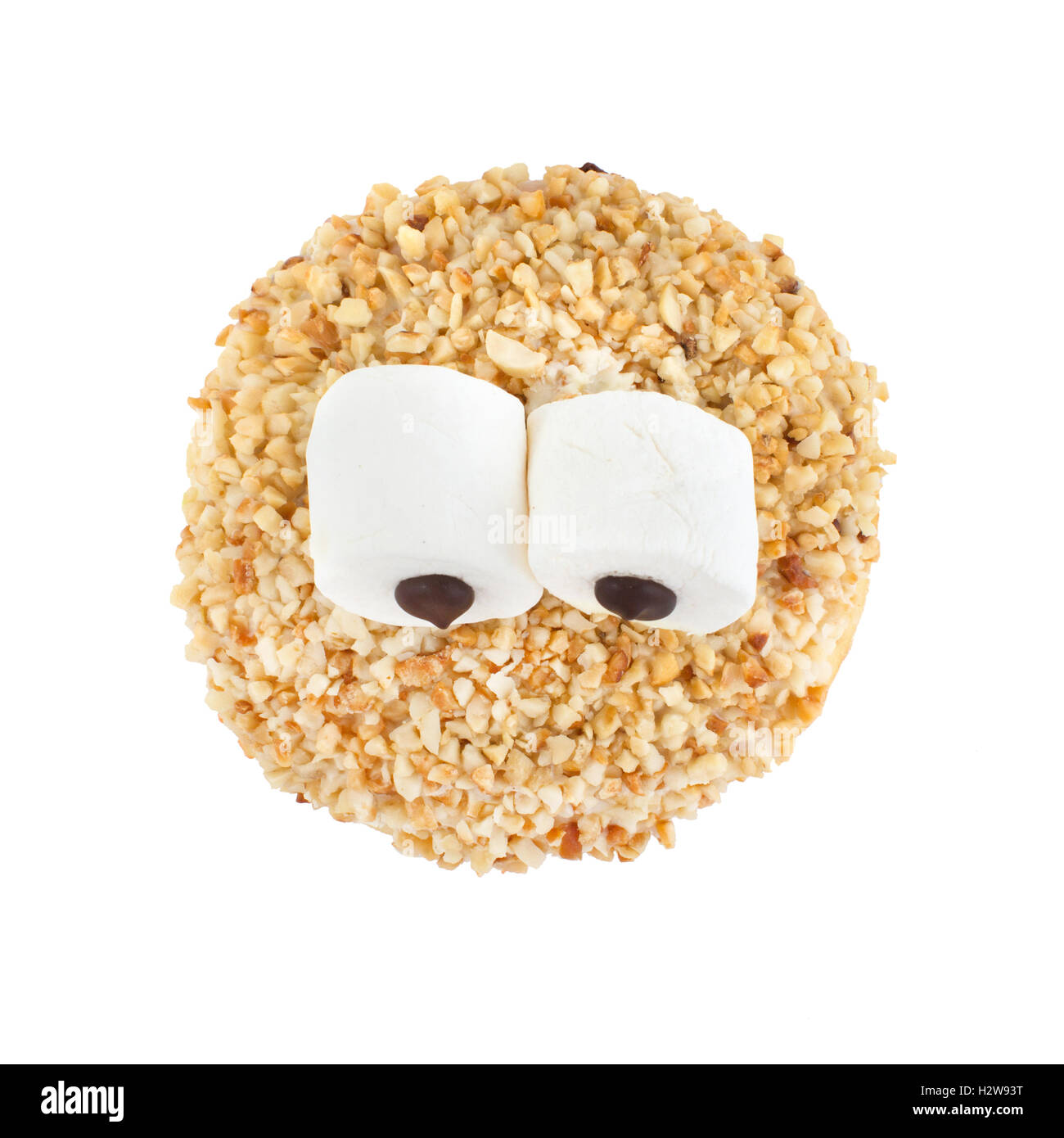 Donut sprinkled with nuts eye snout Stock Photo