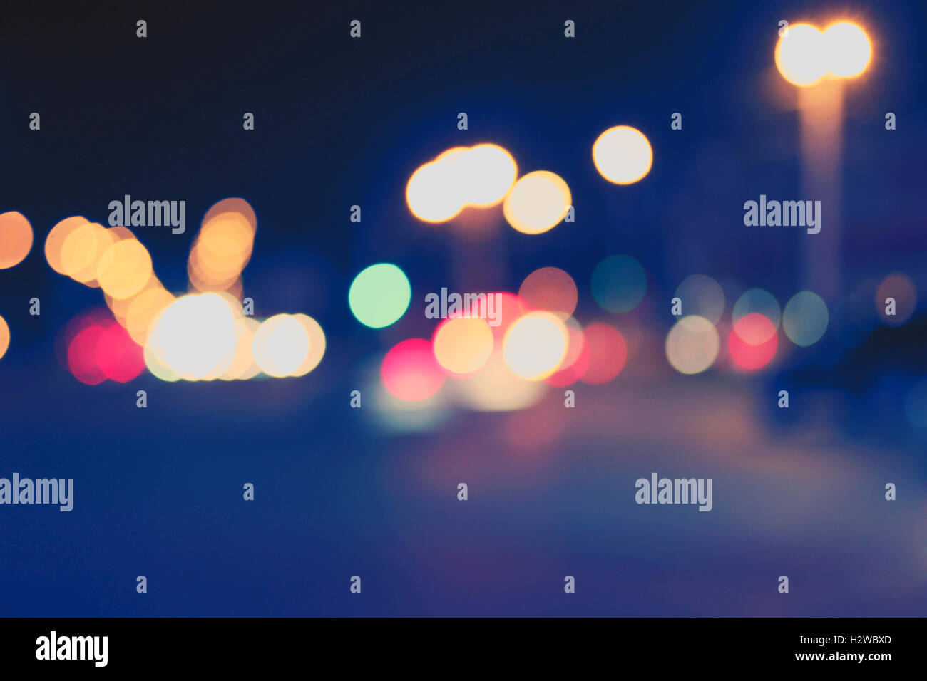 Night lights of the City. Defocused carlights in the night street Stock ...