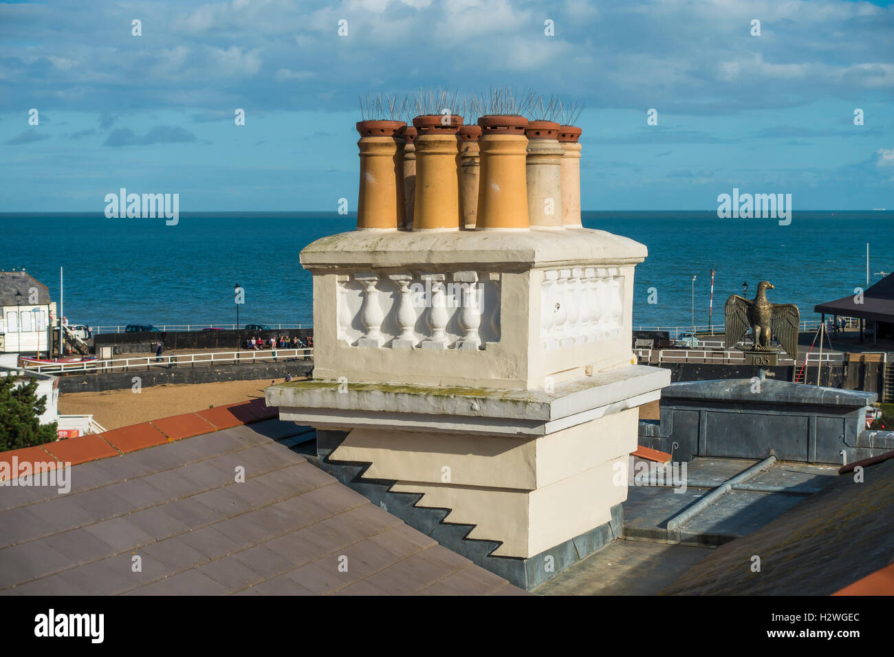 Multi Pot Chimney with Bird Deterent Spikes Fitted Stock Photo