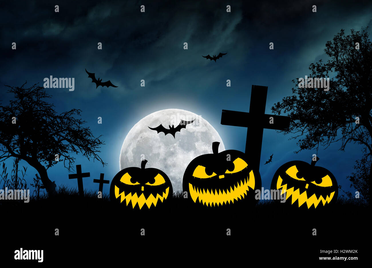 Halloween themed illustration with pumpkins and bats Stock Photo - Alamy