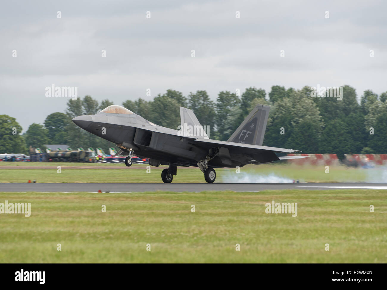 A Lockheed Martin F-22 Raptor Stealth Fighter lands on the runway at RAF Fairford just after displaying at the 2016 Stock Photo