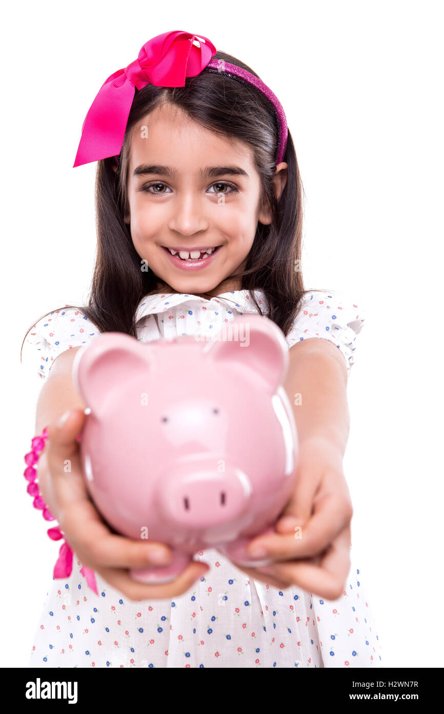 Girl holding a piggy bank Stock Photo - Alamy