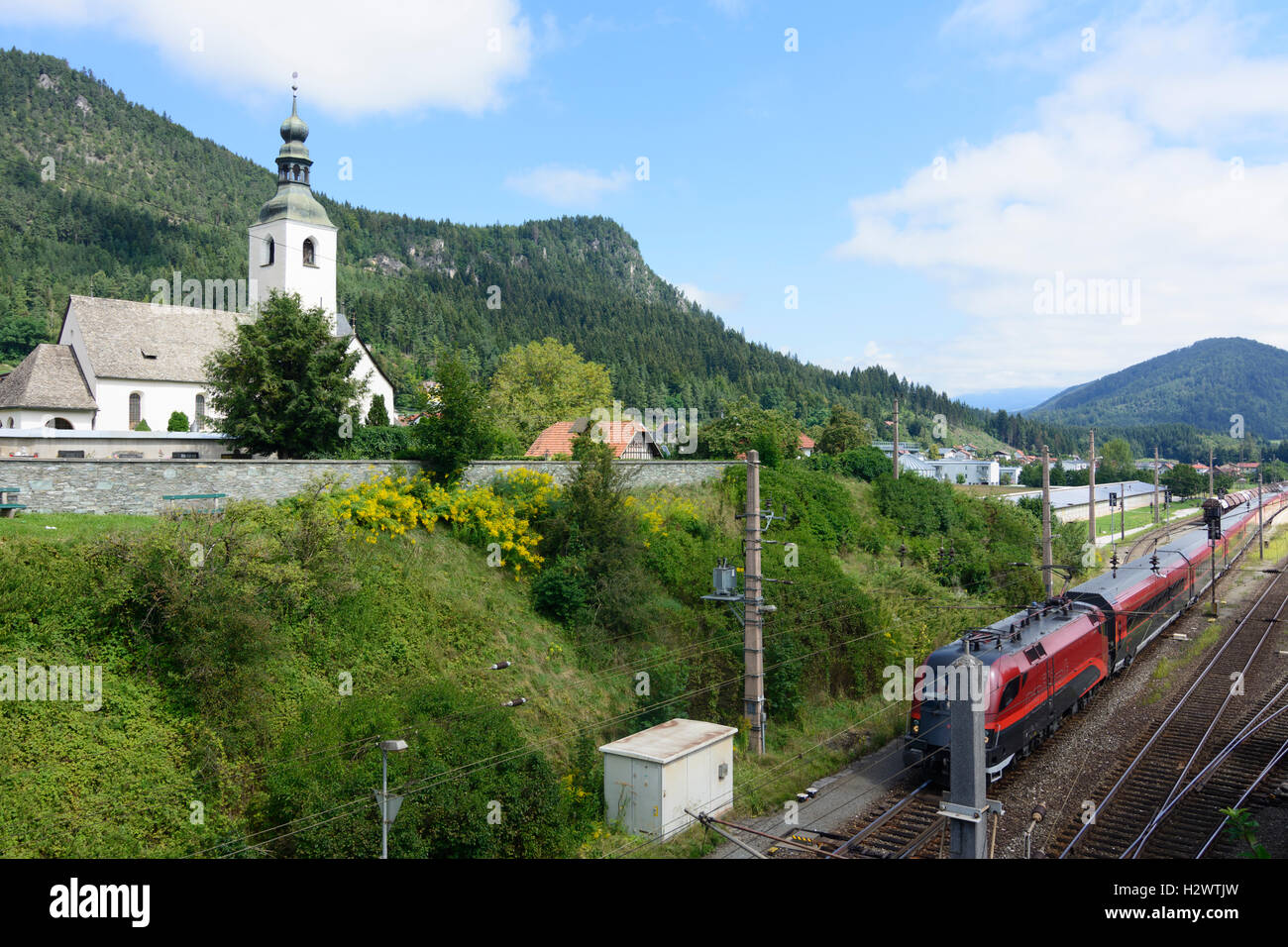 Sankt Georgen am Längsee: church in Launsdorf, Railjet train, , Kärnten, Carinthia, Austria Stock Photo