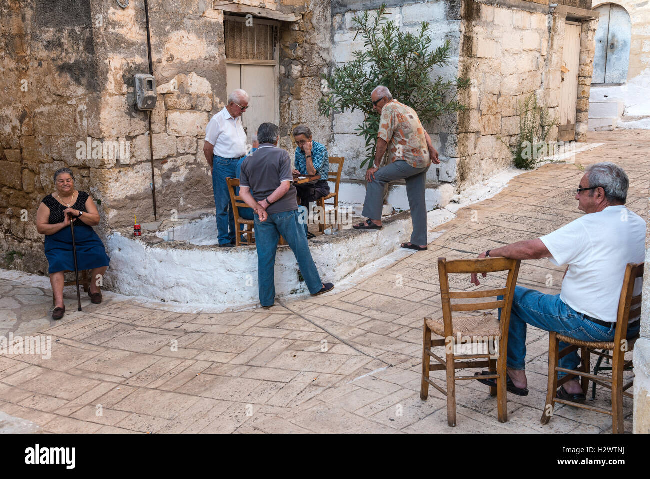 Playing backgammon at a cafe in the village of Proastio, near Kardamyli