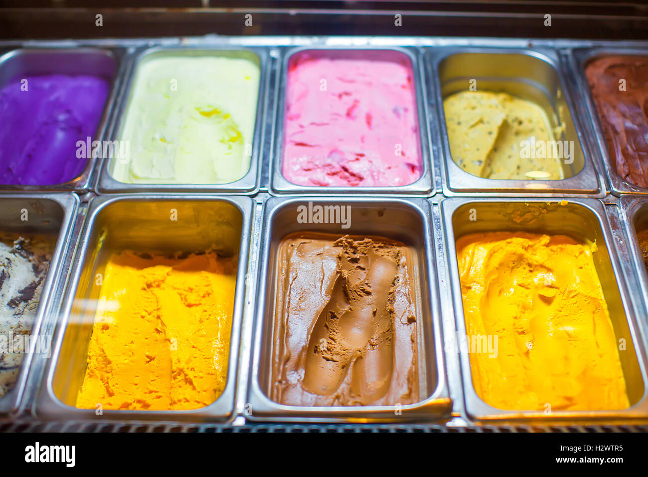 Containers of different sweet ice cream Stock Photo Alamy