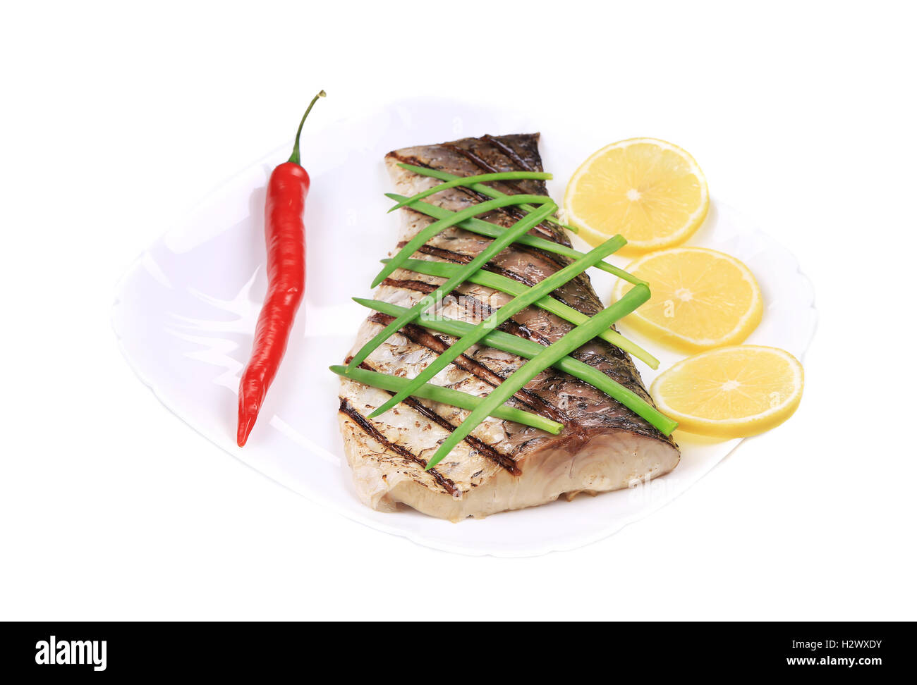 Grilled fish with vegetables Stock Photo - Alamy