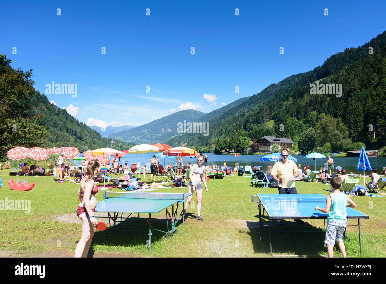 Feld am See: Afritzer See (Lake Afritz), bathers, table tennis, , Kärnten, Carinthia, Austria Stock Photo