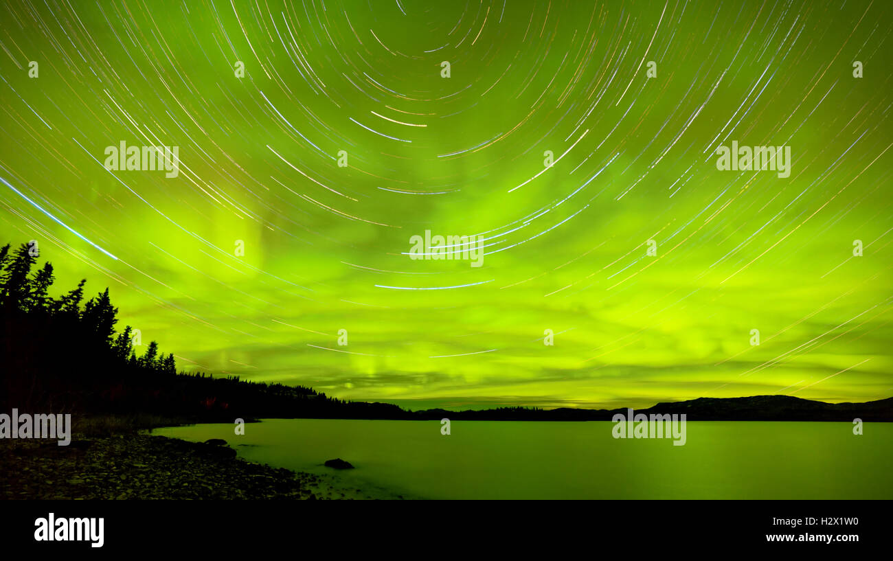 Startrails Northern Lights show over Lake Laberge Stock Photo - Alamy