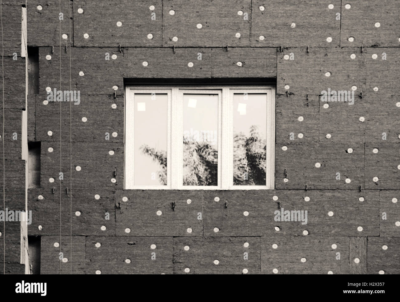 black and white photo windows in a newly built house. wall structure ...