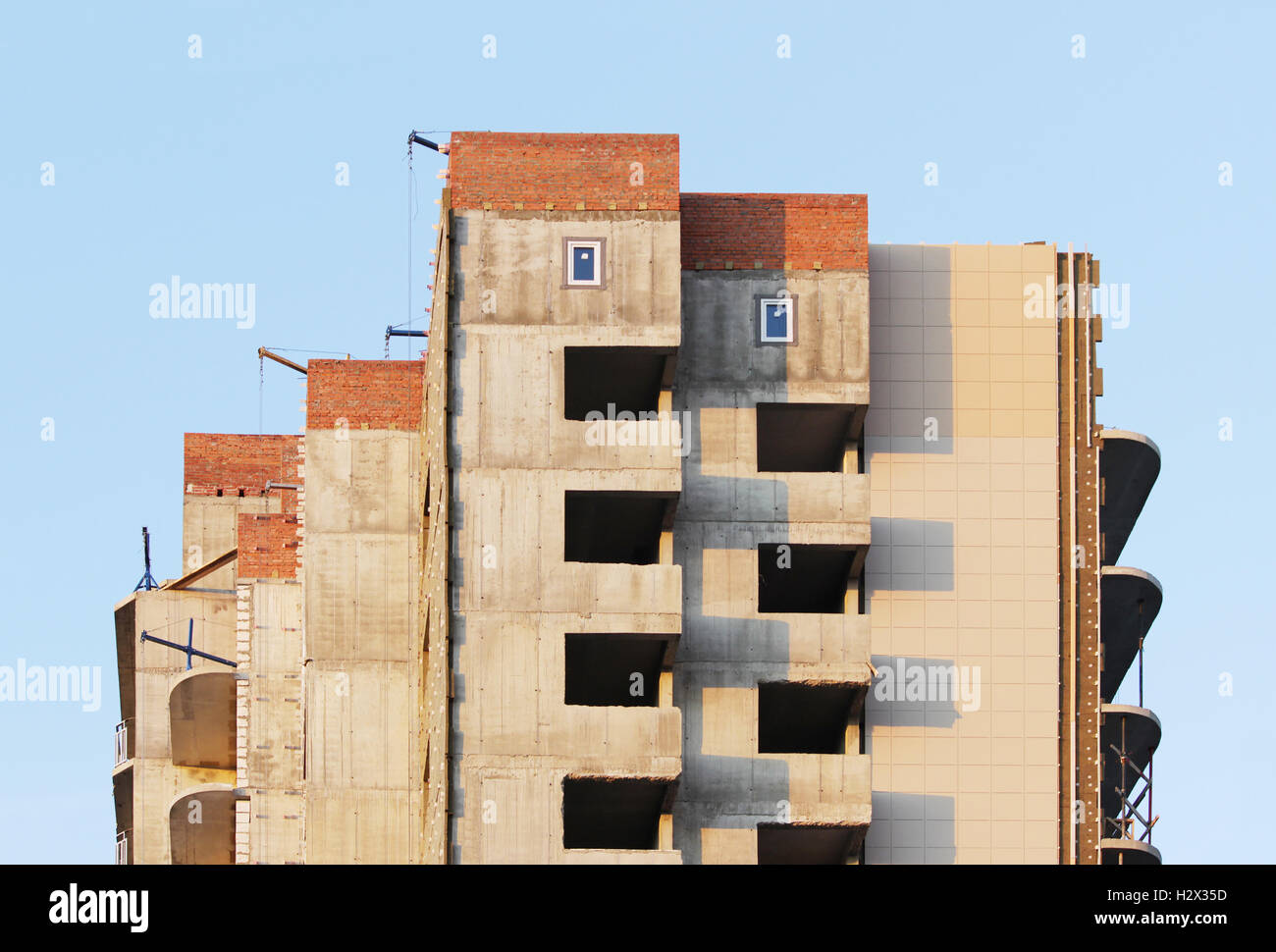 photo windows in a newly built house against a cloudless blue sky Stock ...