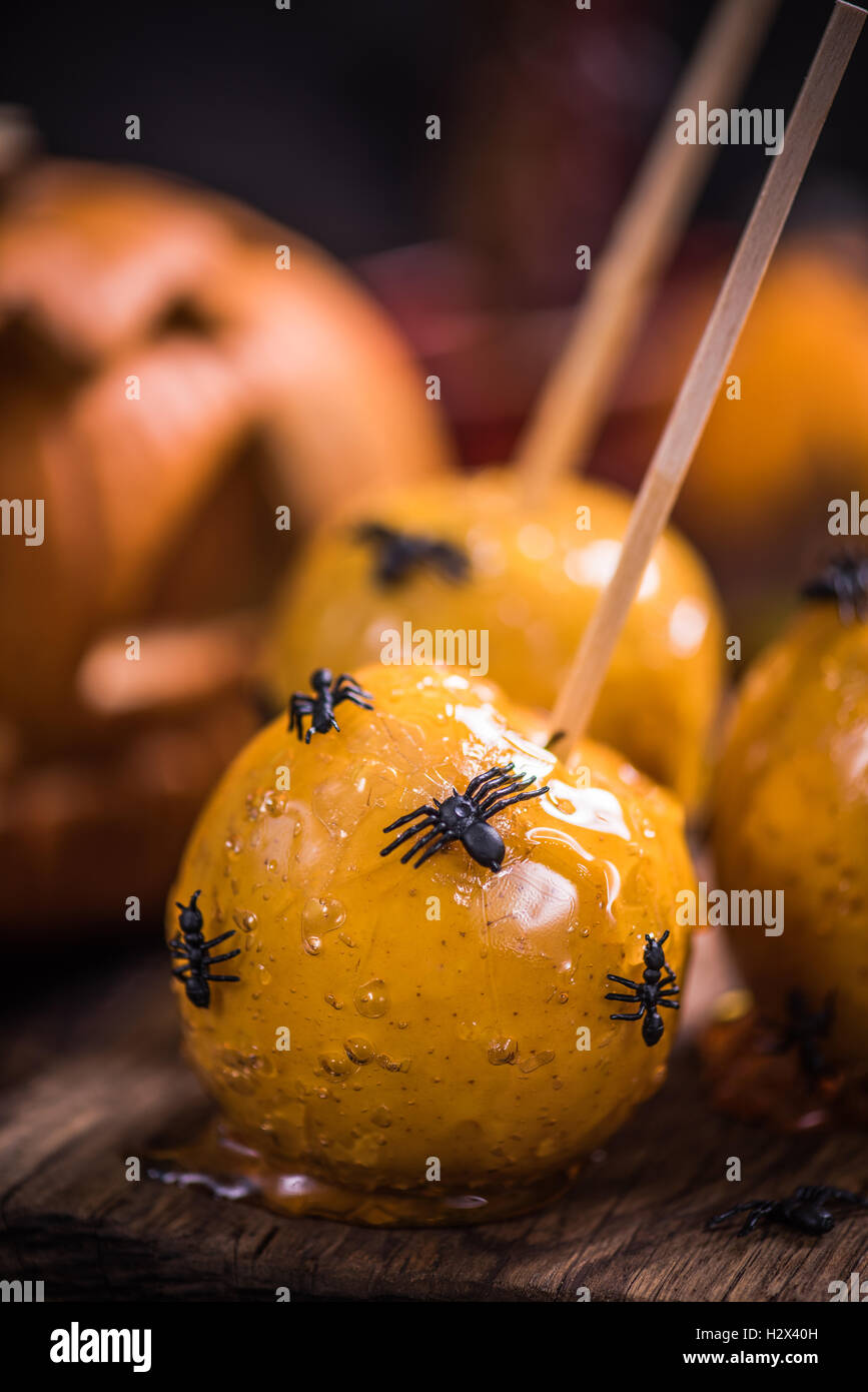 Apple candy Halloween sweet treat, spooky party food Stock Photo
