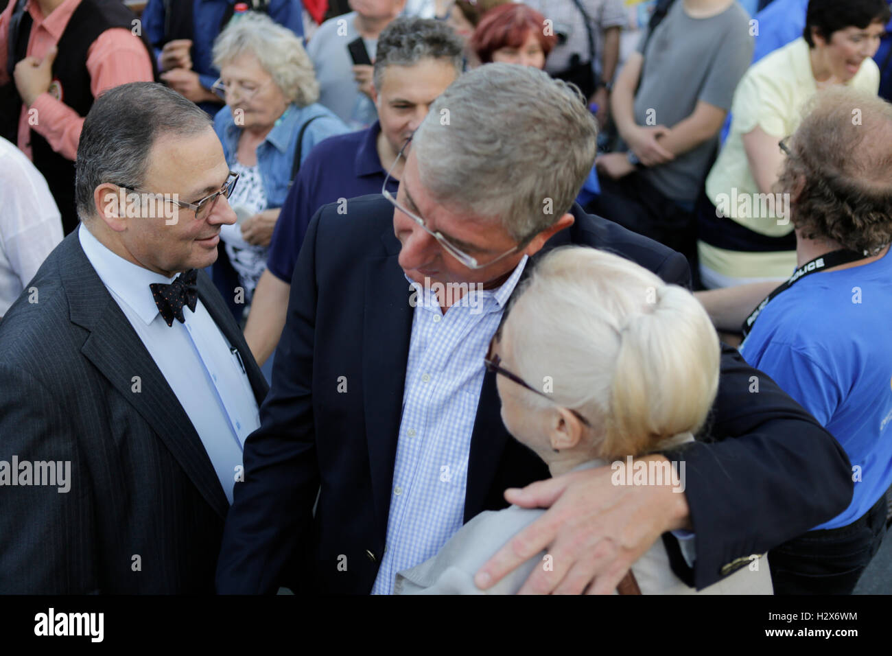 Ferenc Gyurcsany, the leader of Democratic Coalition and the former Prime Minister of Hungary, hugs a supporter of the referendum boycott. The last day ahead of the Hungarian migrant quota referendum saw two protests outside the Hungarian Parliament building. On the one side of the square protested members of the Democratic Coalition, including their leader, the former Prime Minister of Hungary Ferenc Gyurcsany, for a boycott of the referendum. On the other side of the square called supporters of the right wing Jobbik for a ‘No' vote. the Right wing protest was also attended by members of the Stock Photo