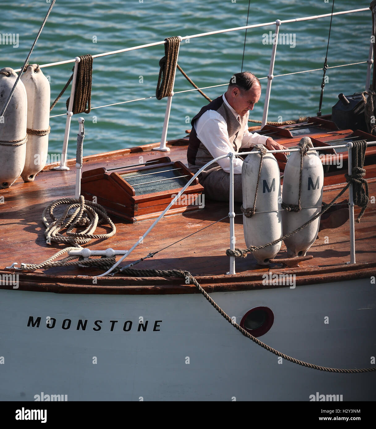 Christopher Nolan directs Mark Rylance, Jack Lowden and Barry Keoghan on a small boat during filming in Weymouth for the movie 'Dunkirk'  Featuring: Mark Rylance Where: Weymouth, United Kingdom When: 27 Jul 2016 Stock Photo