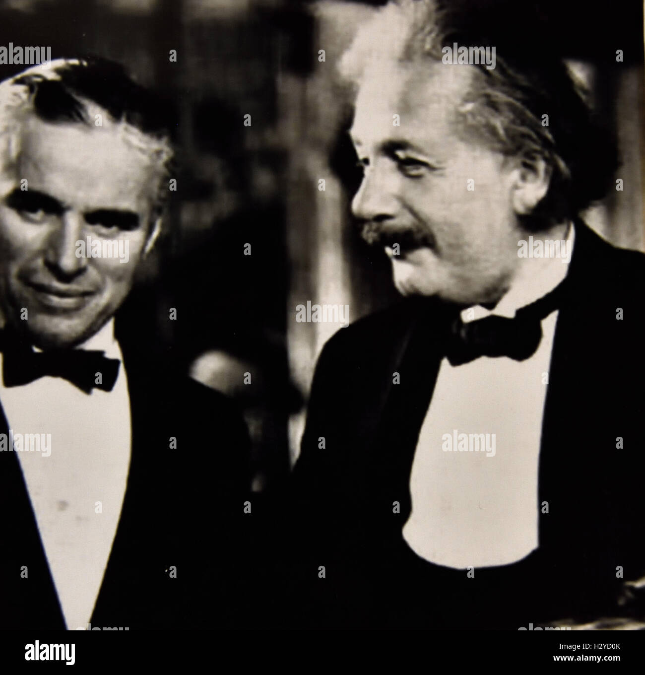 When Albert Einstein met Charlie Chaplin. Einstein said, 'What I admire most about your art, is its universality. You do not say a word, and yet ... the world understands you.' 'It's true', replied Chaplin, 'But your fame is even greater: The world admires you, when nobody understands you Stock Photo