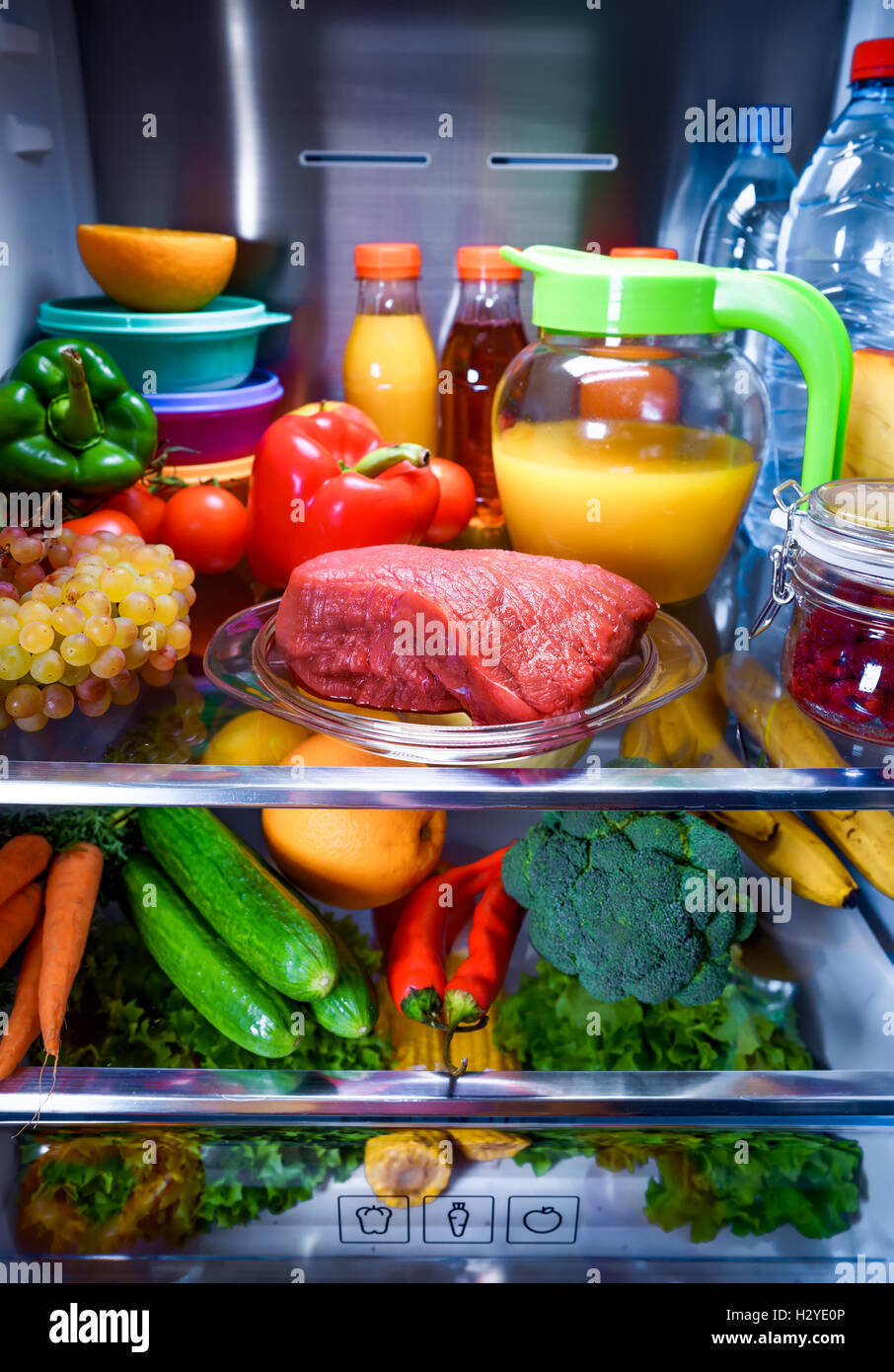 Fresh raw meat on a shelf open refrigerator Stock Photo Alamy