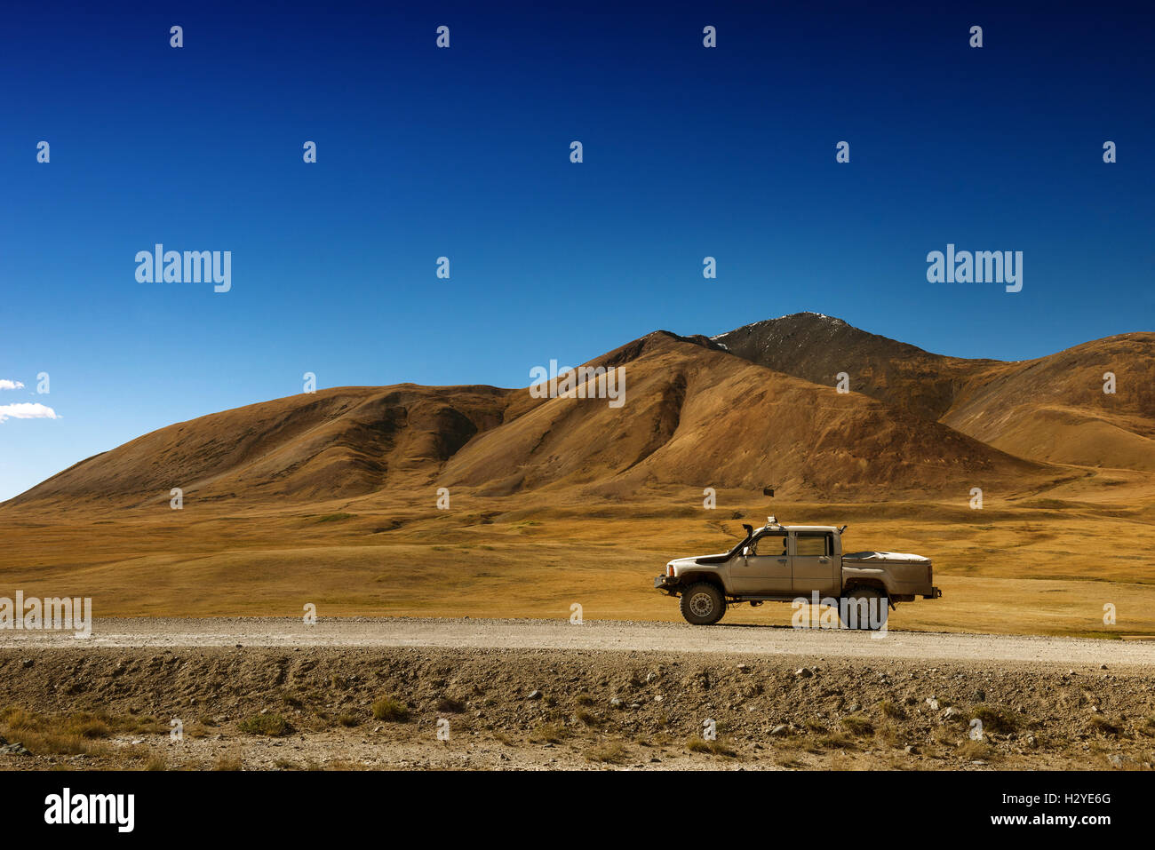 Car SUV on the mountains background Stock Photo