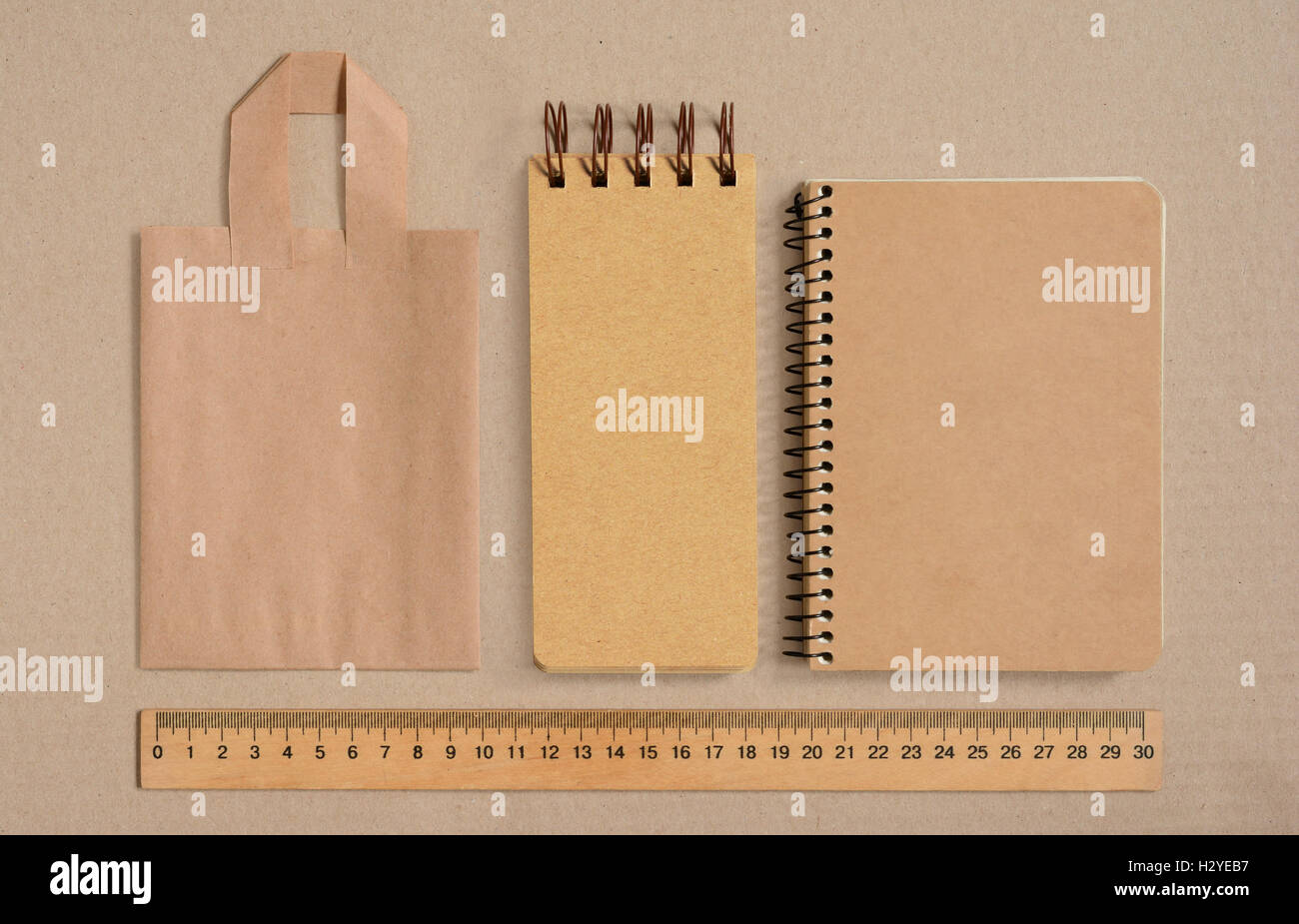 Mock up with craft bag, sketchbooks and wooden ruler on cardboard ...
