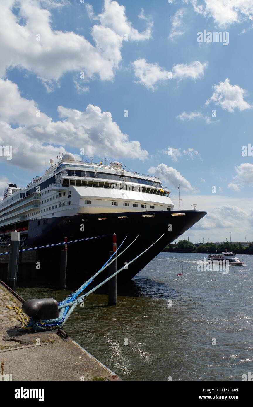 view to the front part of cruise liner moored in the seaport. Closeup