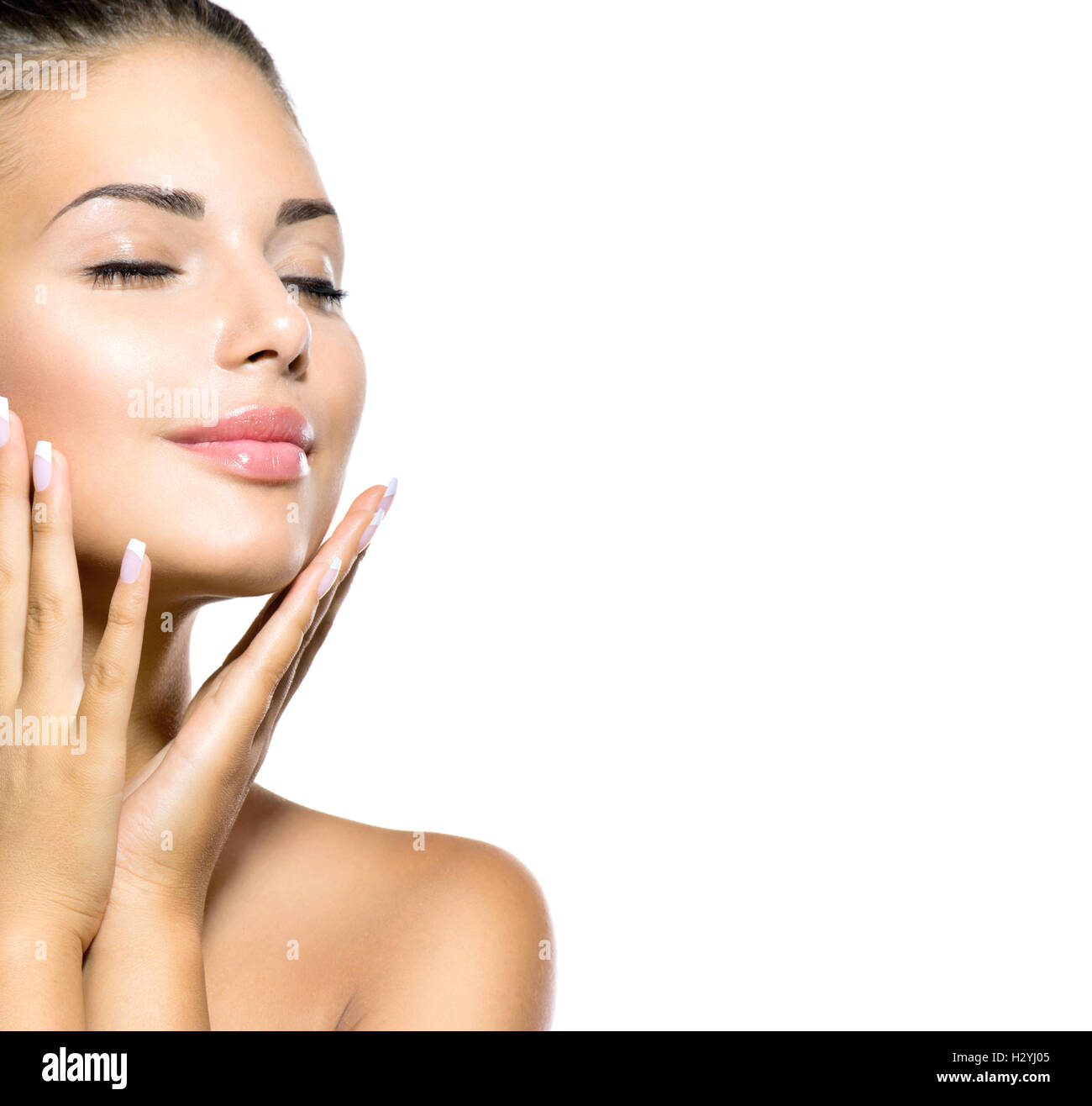 Beauty Spa Woman Portrait. Beautiful Girl Touching her Face Stock Photo ...