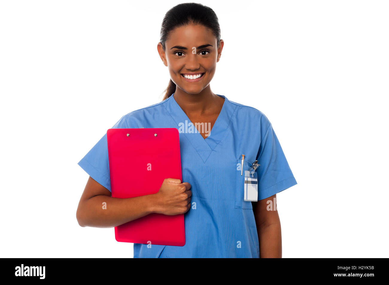 Female nurse holding clipboard, at duty Stock Photo - Alamy