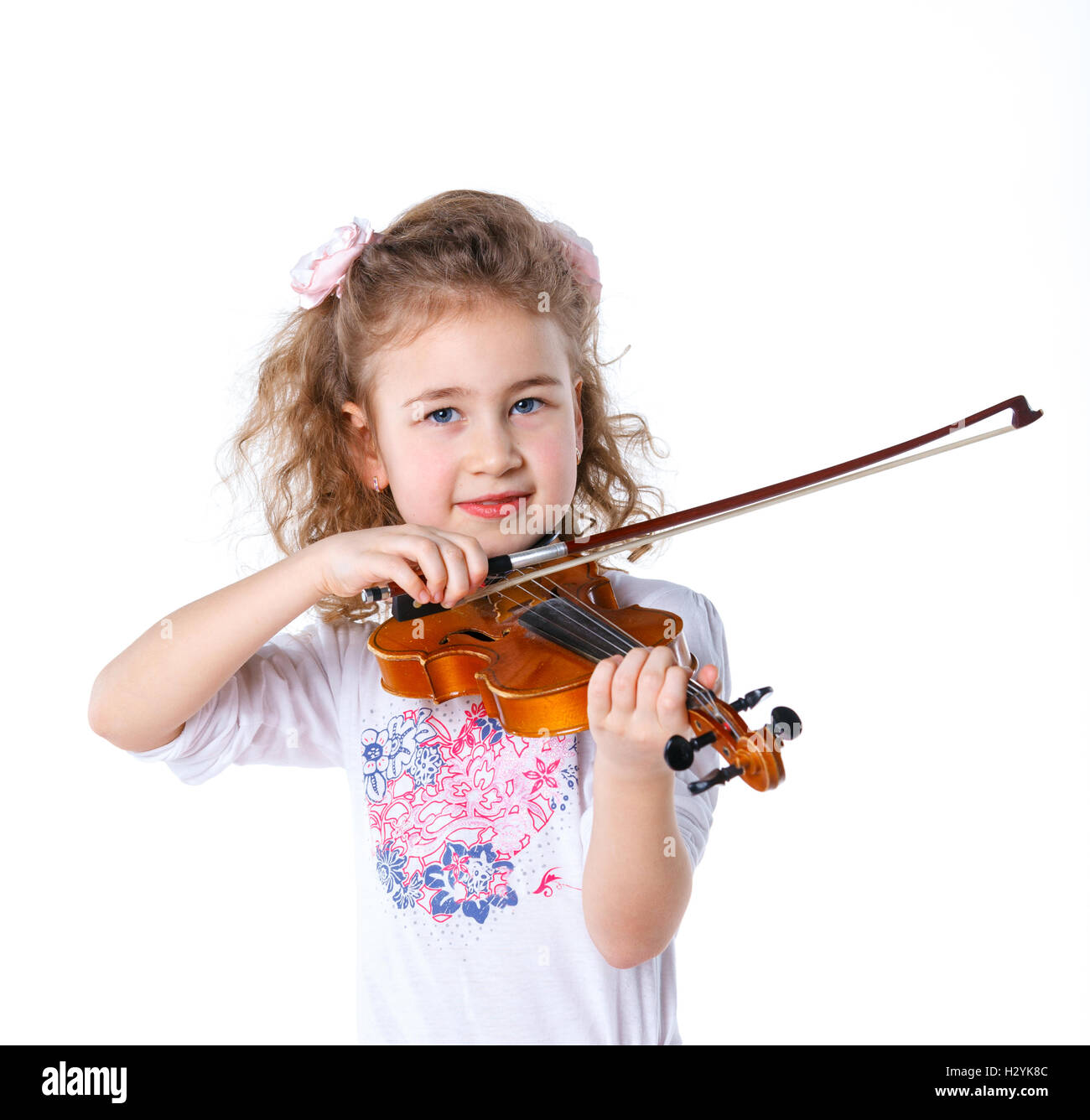 Girl little violinist Stock Photo