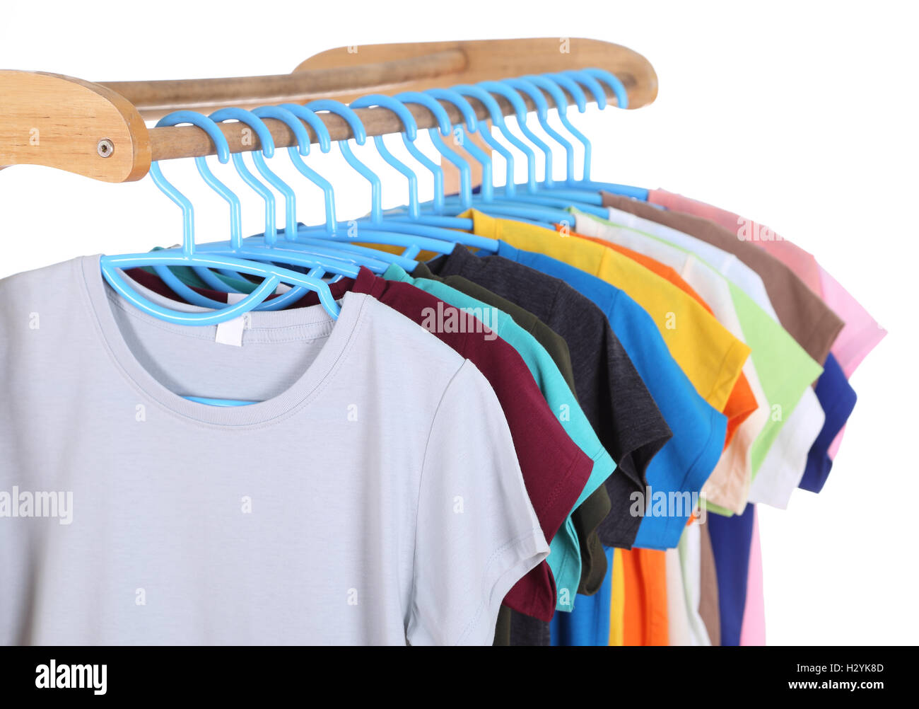 tshirts hanging on hangers Stock Photo Alamy